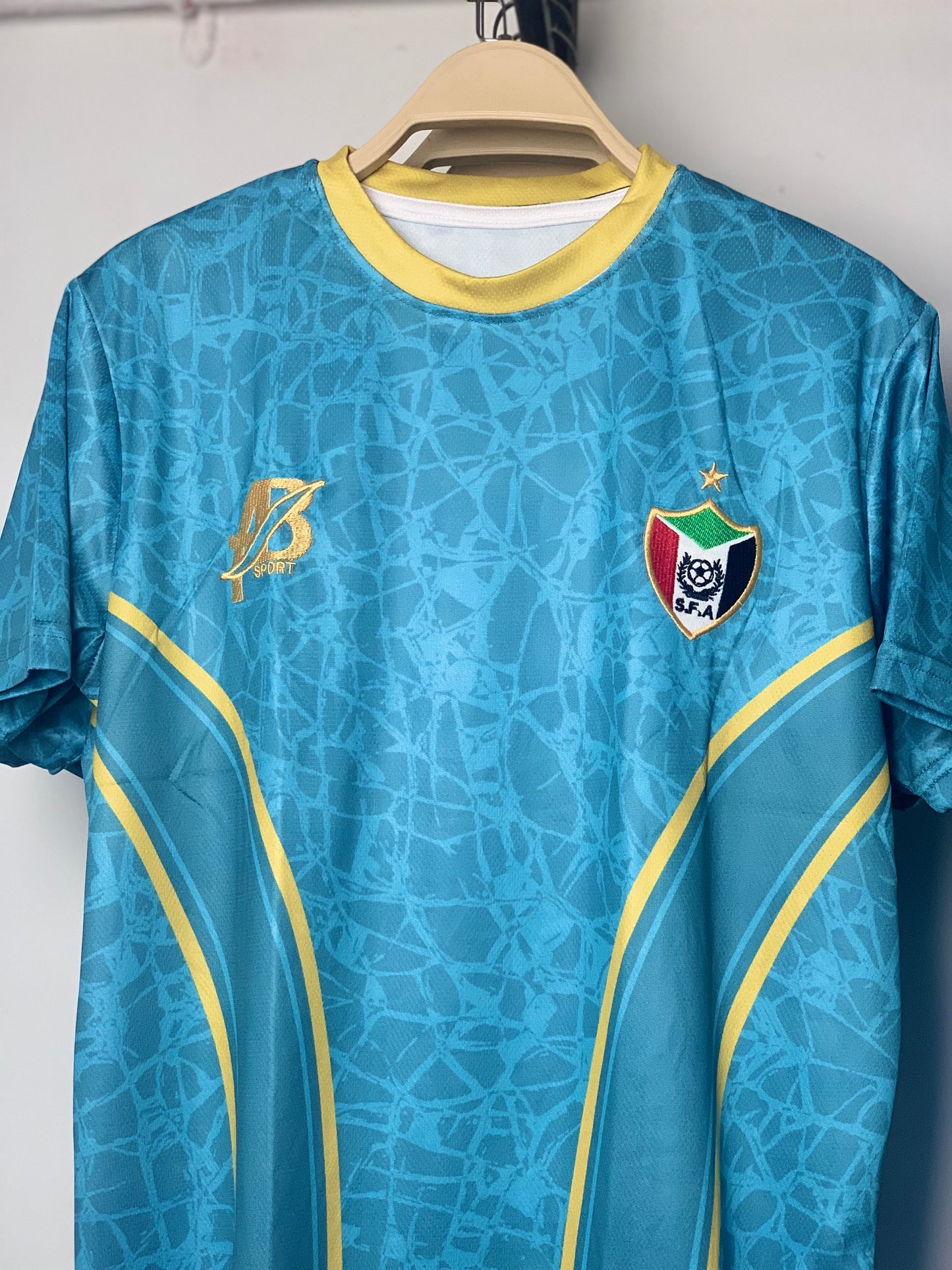 The green Sudanese national team T-shirt